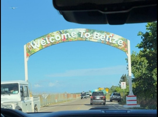 Sign from the belize city airport that says "Welcome To Belize"